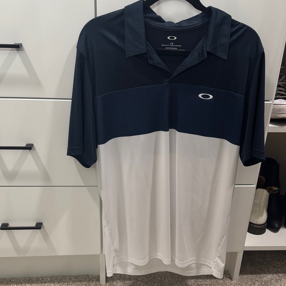 Oakley Men's Polo Shirt in Dark Blue and White
